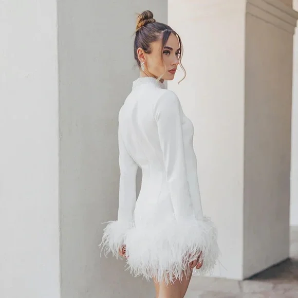 White mini dress with fur trimming from Untamed Petals. - Picture 4 of 6